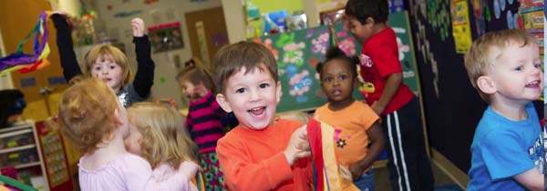 a group of Columbus Ohio preschool kids playing at a preschool